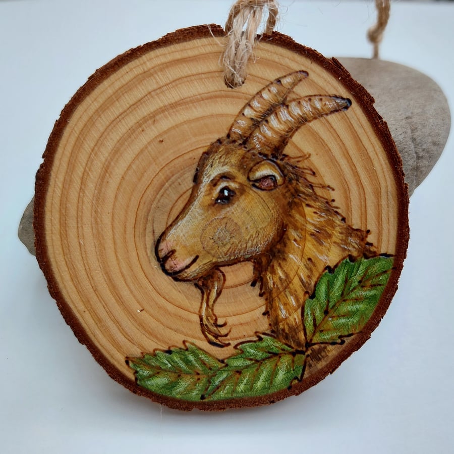 Goat pyrography log slice ornament 
