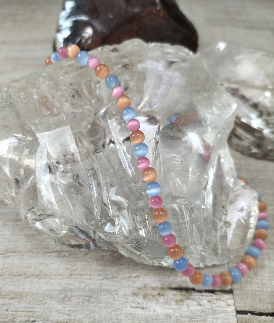 AL87 Pink, blue and beige cats eye beaded anklet, 27cm