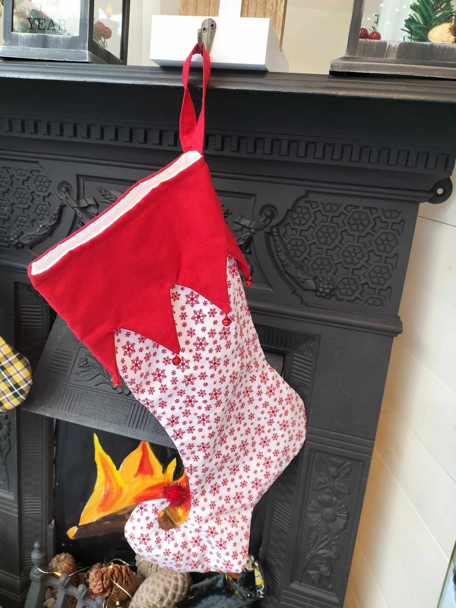 CS03  Pixie elf Christmas stocking, red snowflake