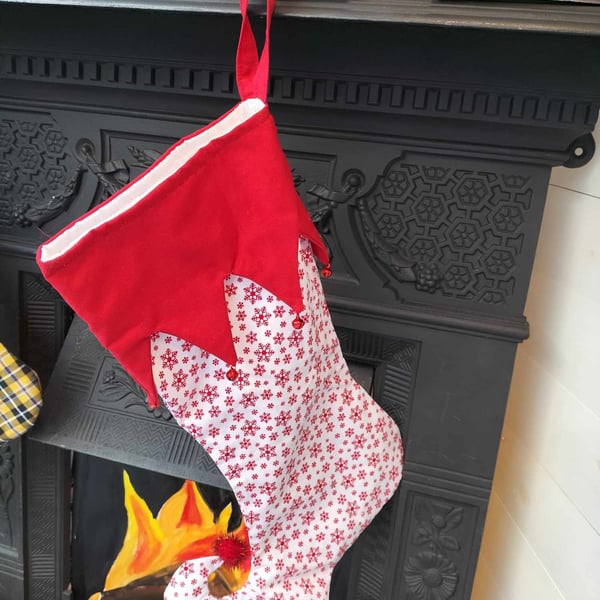 CS03  Pixie elf Christmas stocking, red snowflake