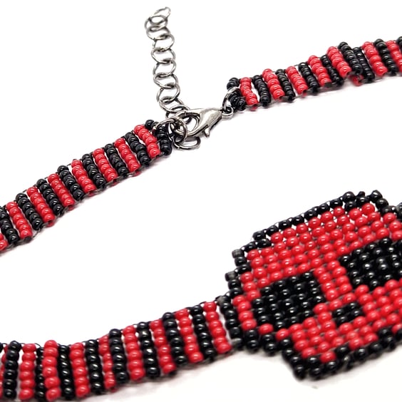 Red and black beaded skull striped choker necklace