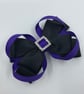 Black Double Layer Bow with Purple Loops on Clip - Image 1