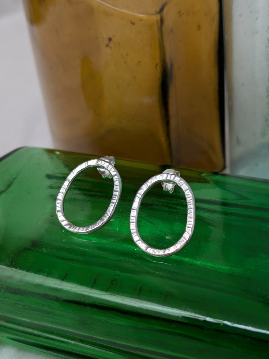 Sterling silver wobbly oval studs 