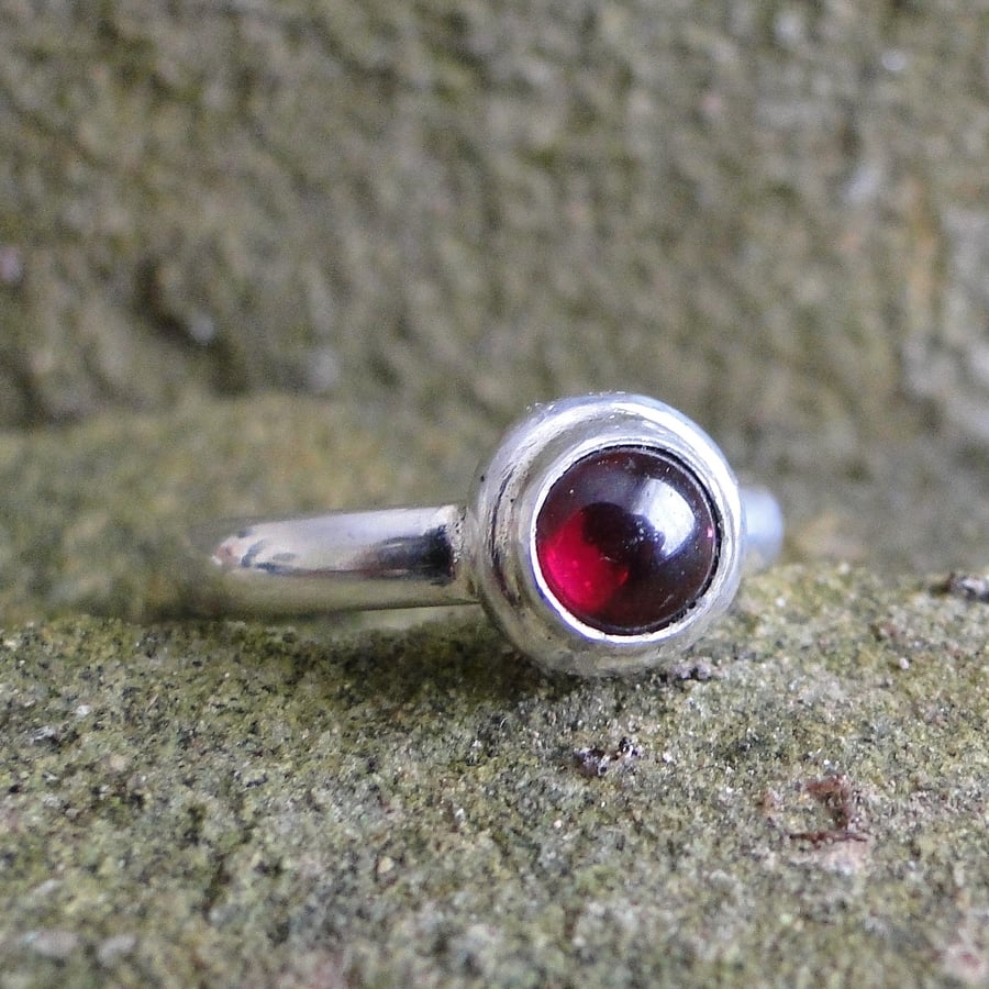 Silver ring with a Garnet in an organic silver Folksy