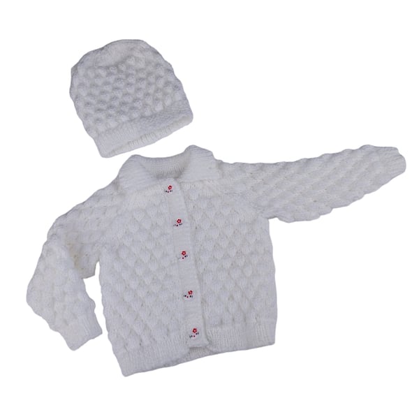 White baby cardigan and hat hand knitted in bubble stitch to fit 0 - 9 months 