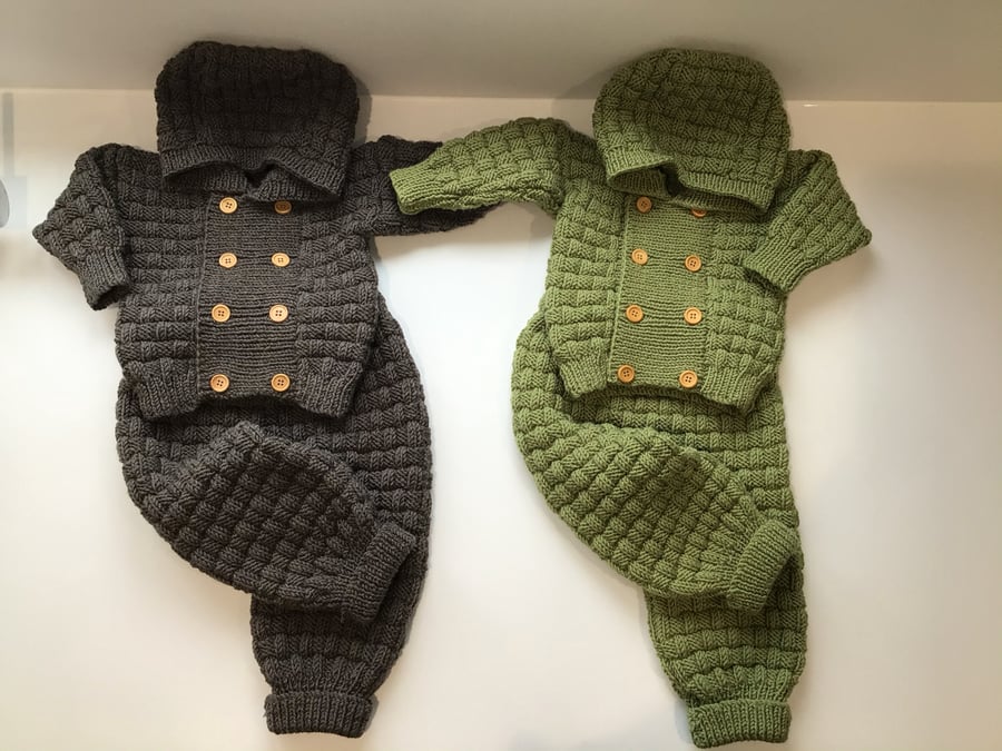 Hand knitted baby suit 