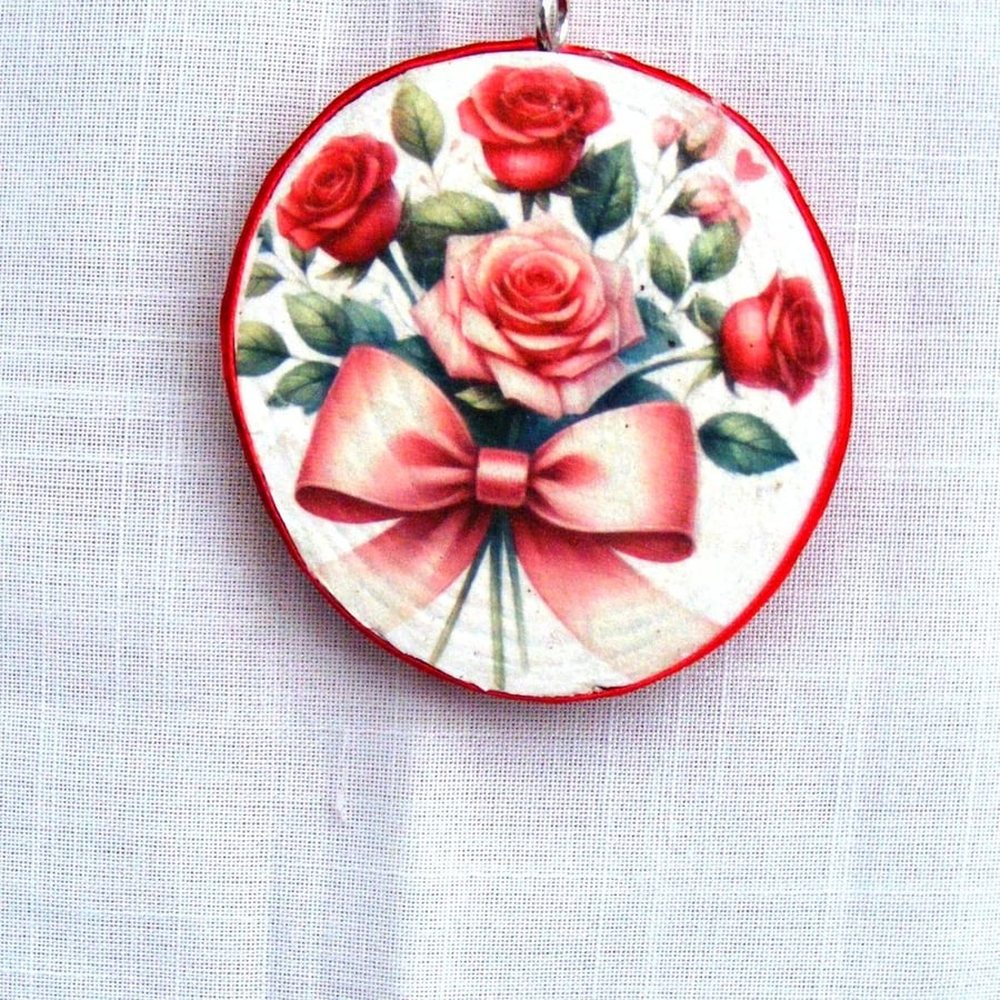 Bouquet of red roses decoupaged log slice wall decoration.