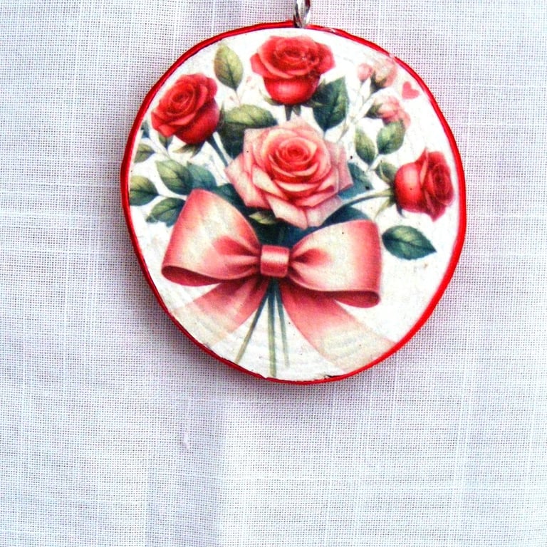 Bouquet of red roses decoupaged log slice wall decoration.