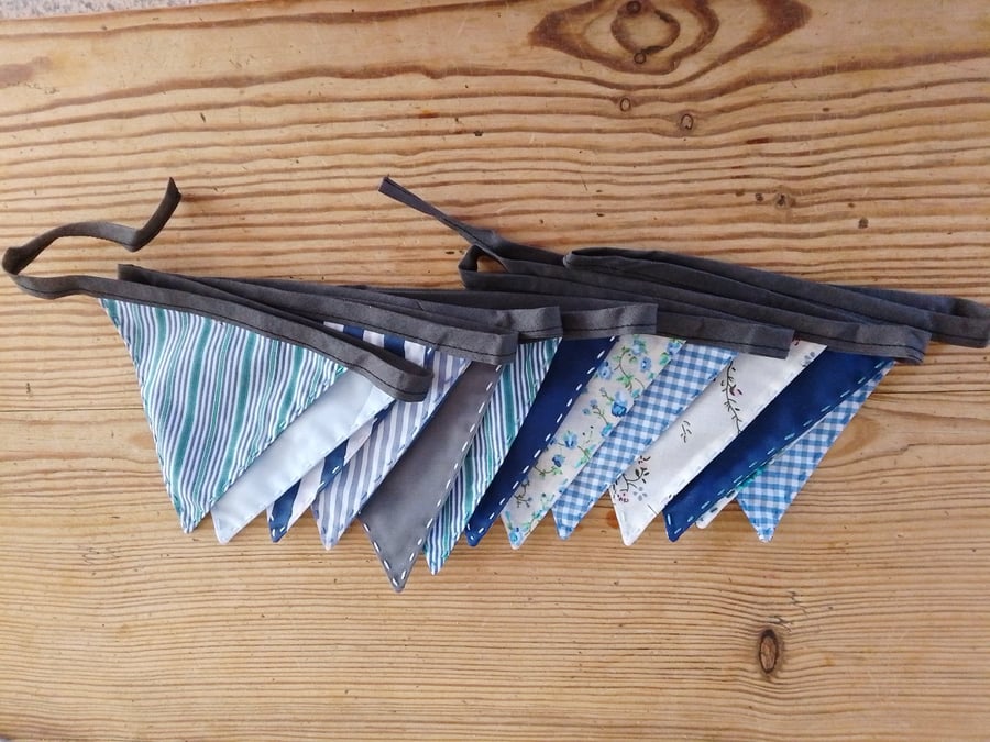 Handmade mini bunting in a blue theme.