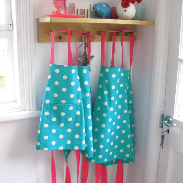 Jolly Spotty Kids Aprons Four Sizes 1-9yrs for Girls, Blue with Bright Pink Ties