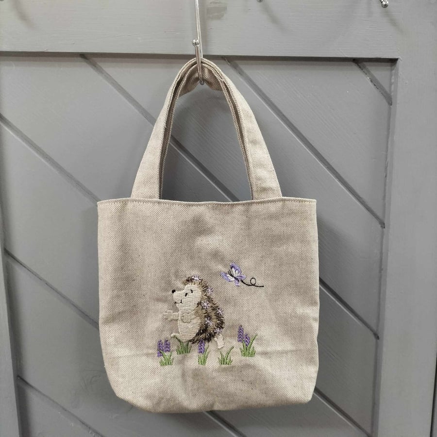 Linen look small tote bag with hedgehog embroidery