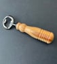 Bottle opener made with plum hardwood - Image 1