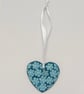 Teal clay heart hanging decoration embossed with flowers - Image 4