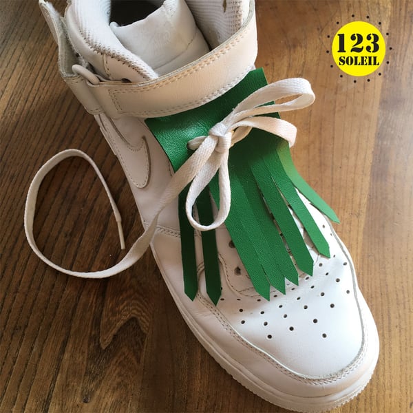 shoe accessory, removable fringe, leather accessory, green