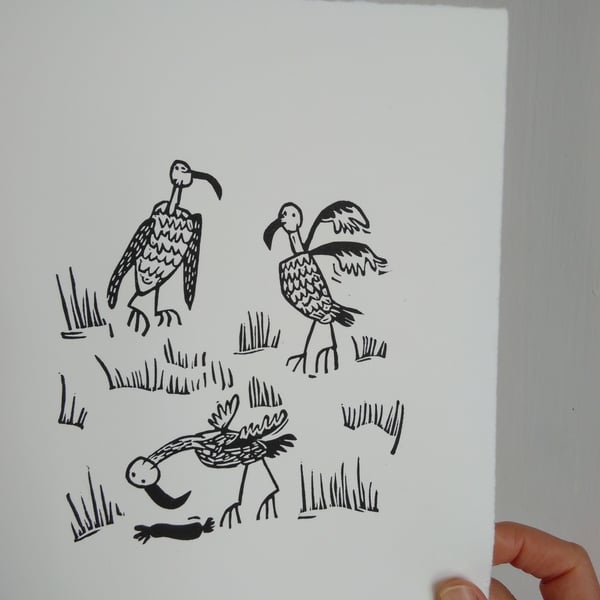 Three Vultures in a Field with a Sausage - lino cut print