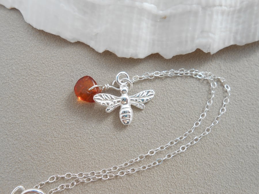 Sterling silver bee and baltic amber 7” bracelet.