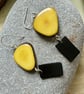 Handmade unique yellow and black tagua nut dangle earrings