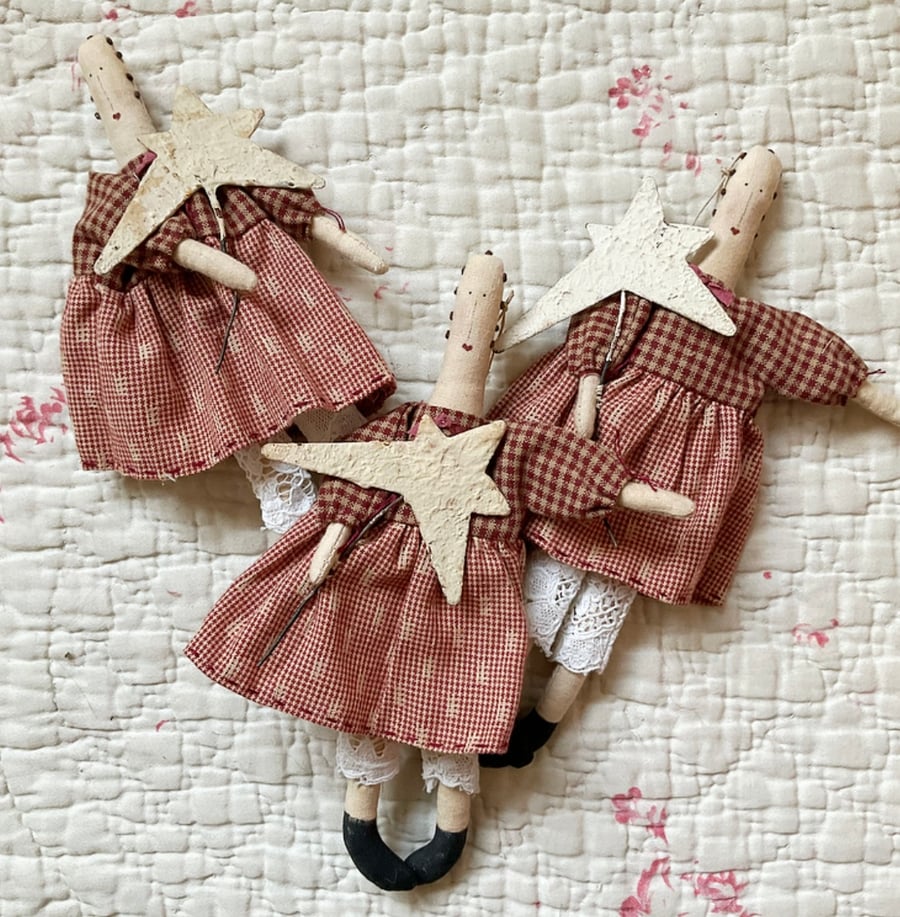 Miniature doll with Primitive star