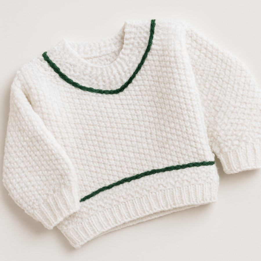 Anyone for cricket?  Or tennis, with this white jumper with green highlights 