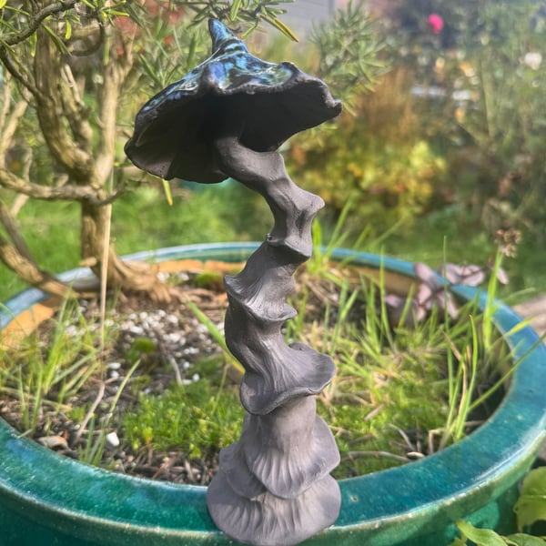 Raw clay sculpted fungi 