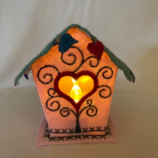 Little embroidered felt fabric tea light bird house. 