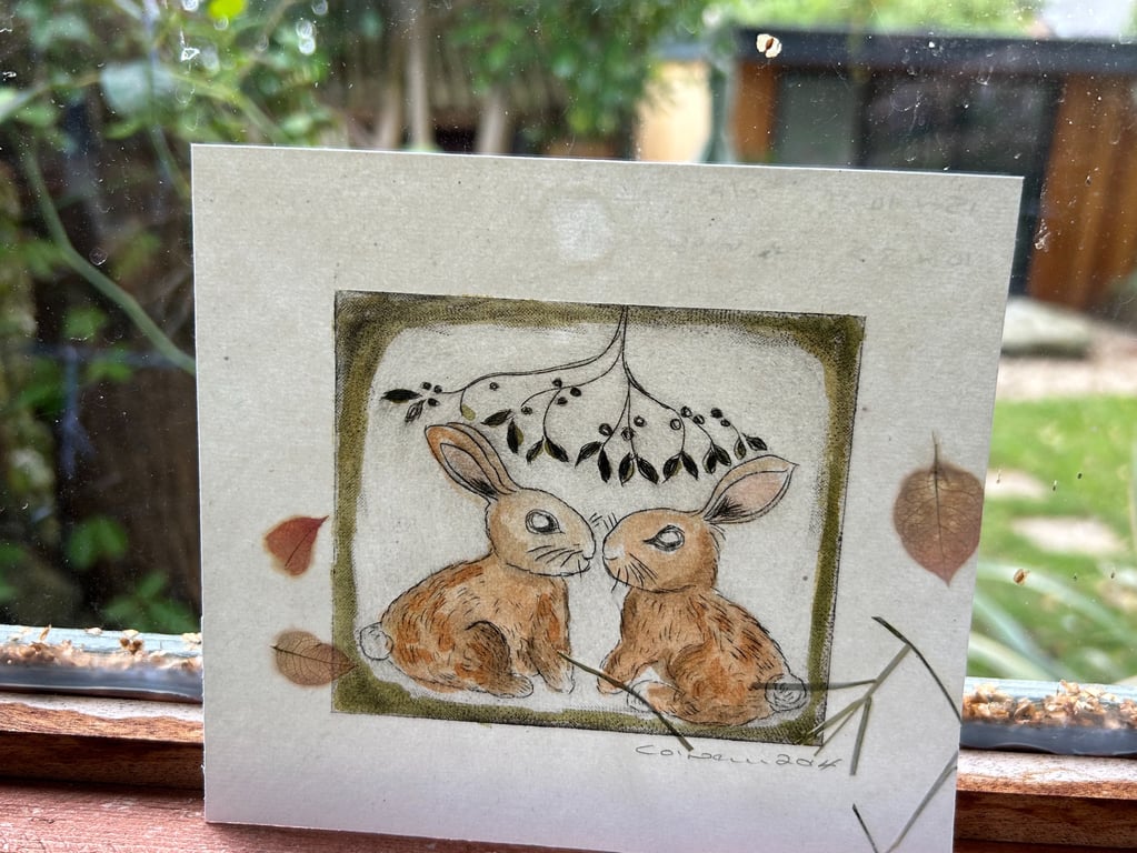 Bunnies under the mistletoe - Drypoint etching.  Made in Yorkshire