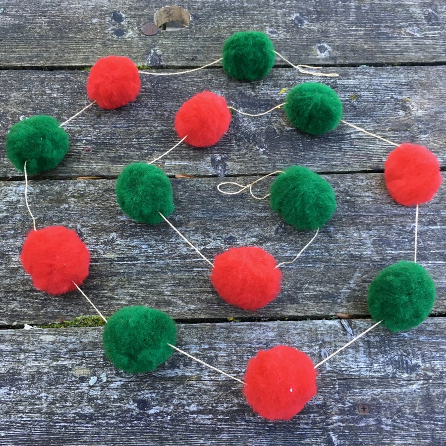 Christmas pom pom garland, red and green on gold thread