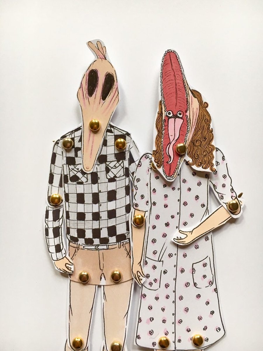 Beetlejuice print. Adam and Barbra Maitland dolls
