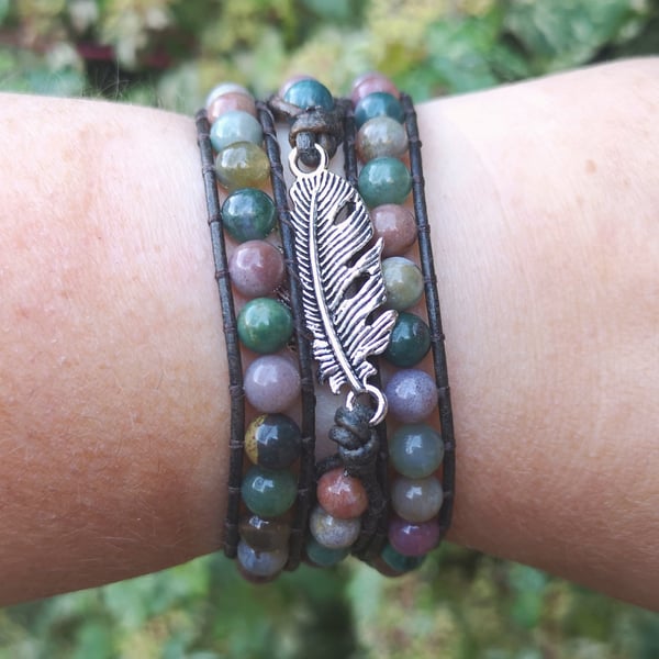 Rainbow jasper and leather bracelet with feather connector and flower button 