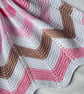 Pink white and chocolate brown, hand knitted baby blanket. - Image 1