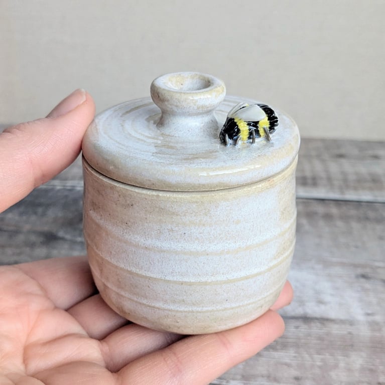 Small ceramic lidded blue pot with mini bee
