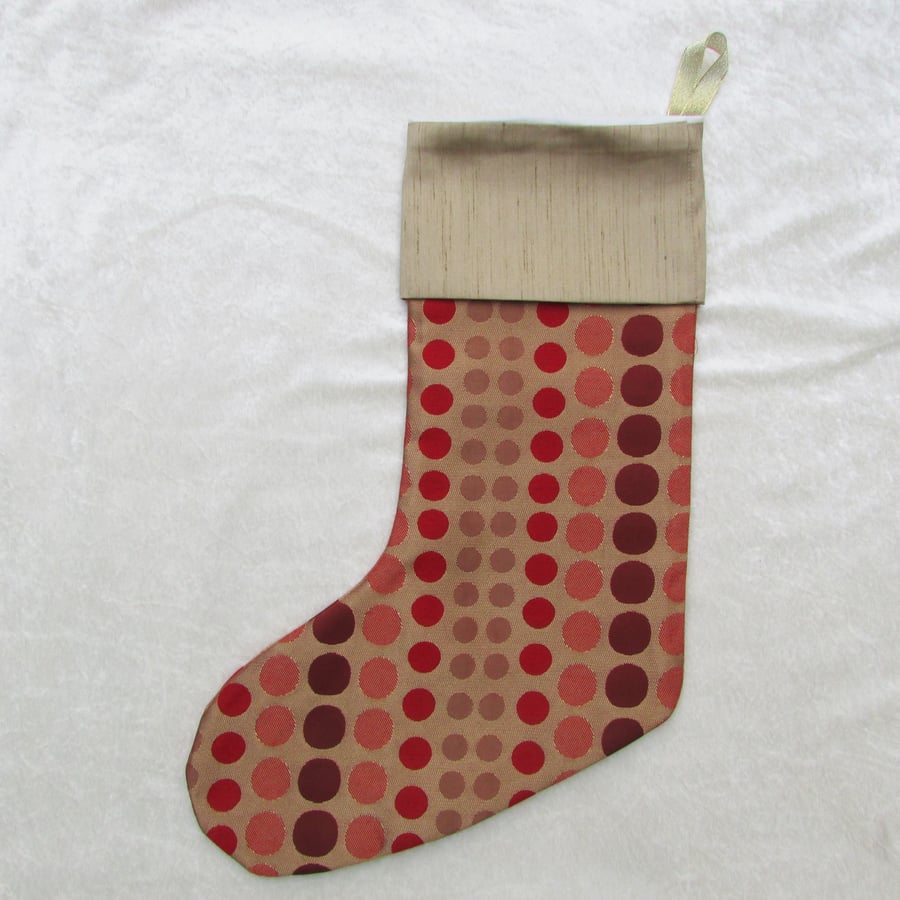 Large spotted Christmas stocking with gold cuff