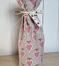 Fabric Bottle Bag in a Rose Hearts pattern