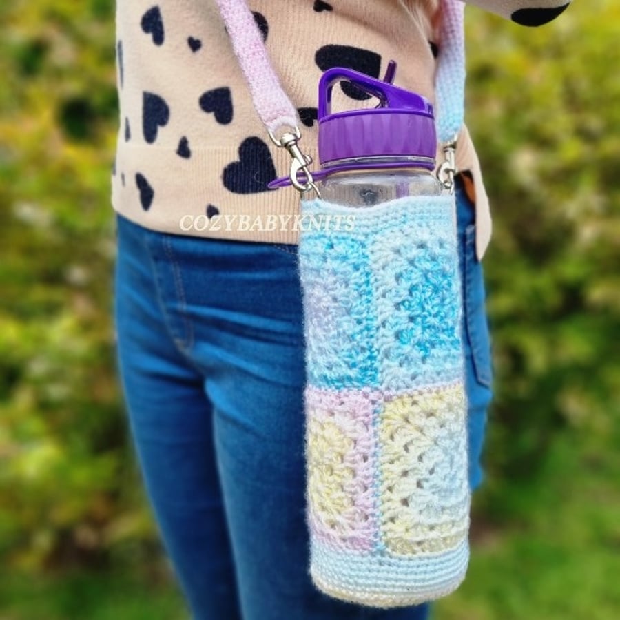 CROSSBODY BOTTLE BAG  (8) MADE WITH MULTI COLOURED YARN