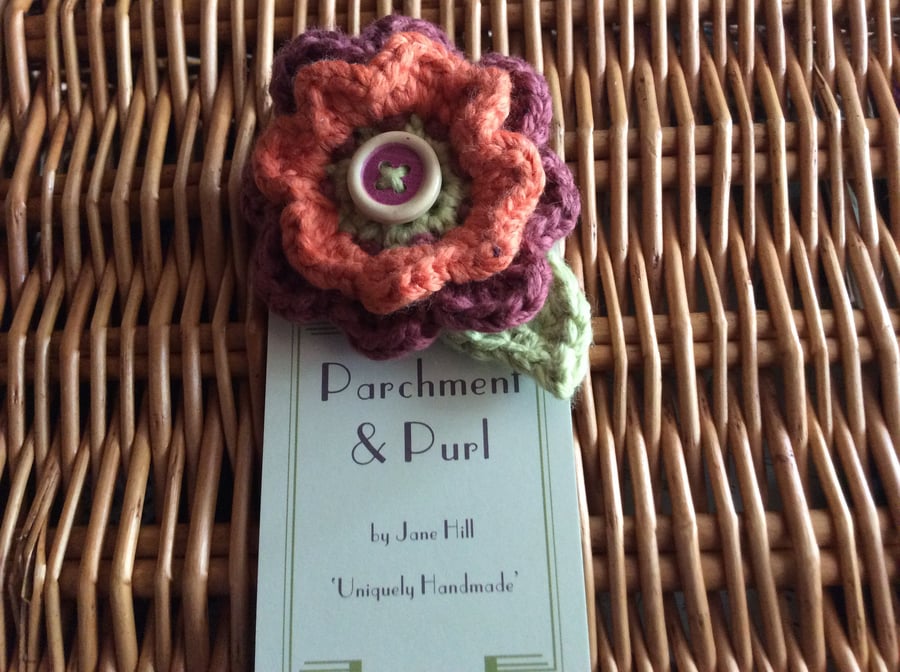 Hand crocheted Flower Brooch with added wooden button