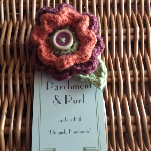 Hand crocheted Flower Brooch with added wooden button