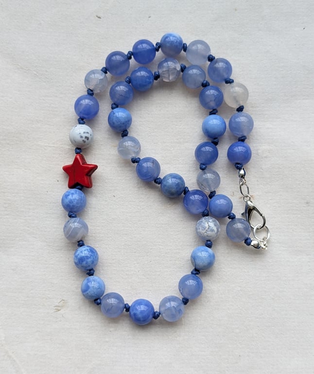 Blue fire agate knotted necklace with red howlite star 