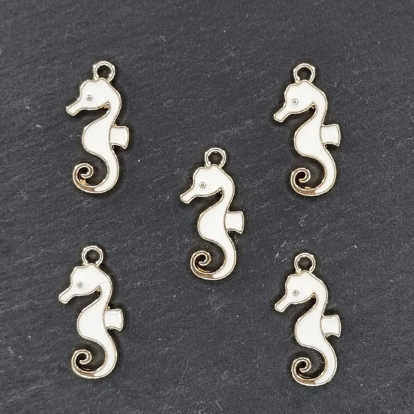 5 white enamel seahorse charms 