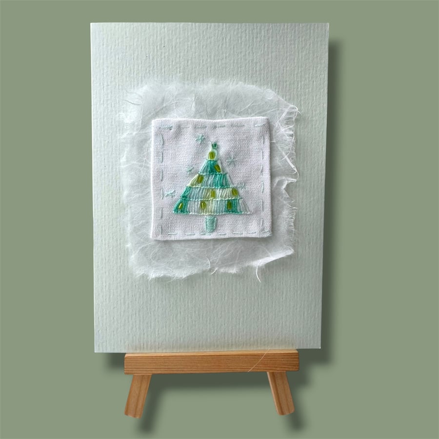 Hand embroidered Christmas card with modern tree picture. Luxury, unique