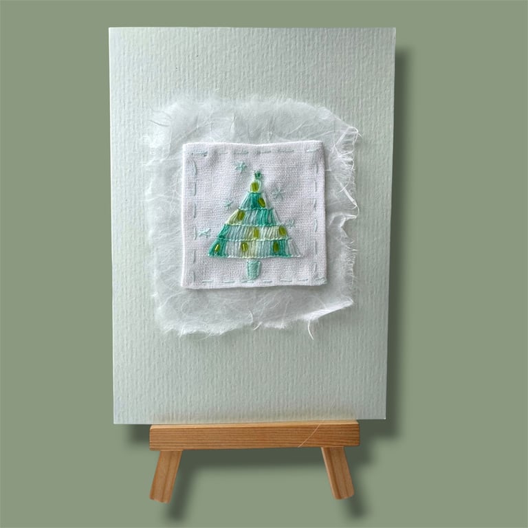 Hand embroidered Christmas card with modern tree picture. Luxury, unique
