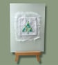 Hand embroidered Christmas card with modern tree picture. Luxury, unique