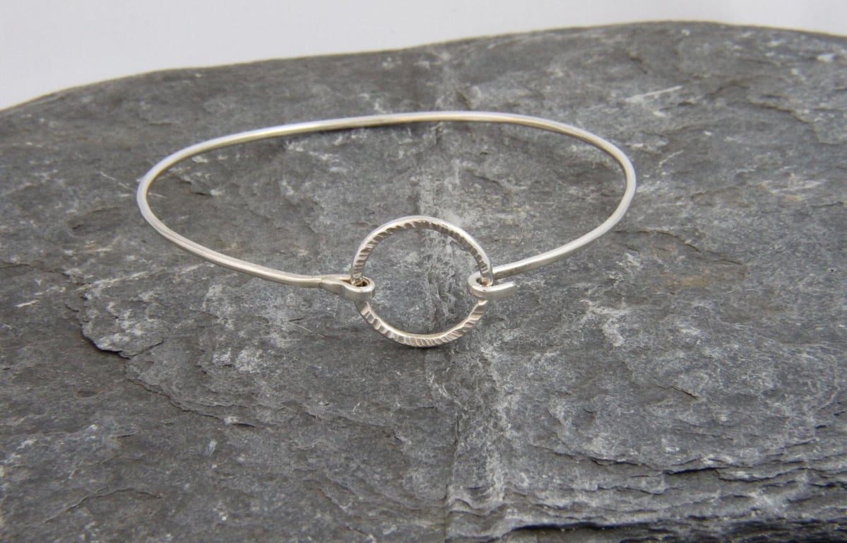 Hammered Circle Clasp Tension Sterling Silver Bangle