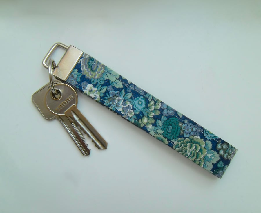 Key ring wrist strap in blue green Liberty fabric