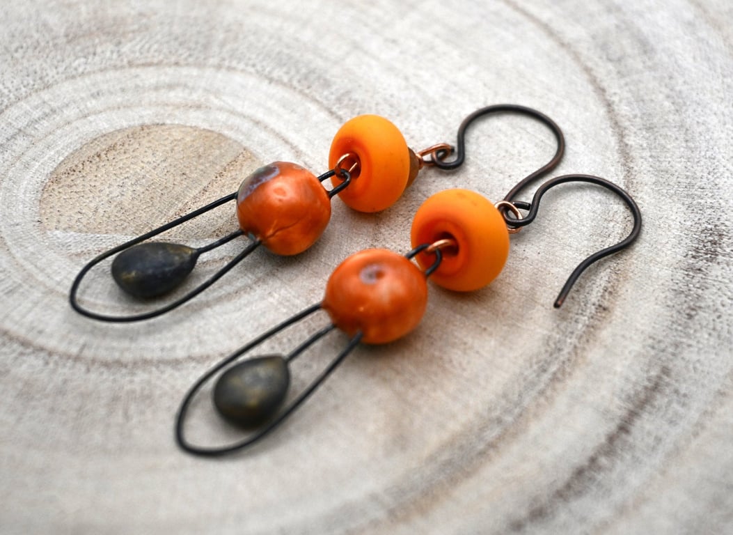 copper, orange lampwork glass and ceramic earrings