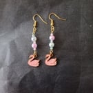 Pastel bead and pink swan charm dangle earrings