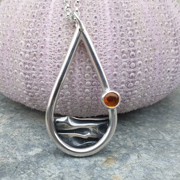 Silver sea mountains hills pendant with amber sun