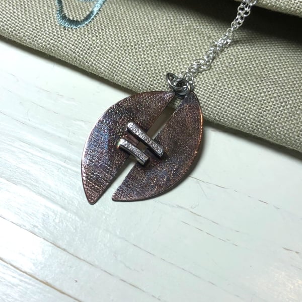 Patinated Copper Pendant with Silver Accents