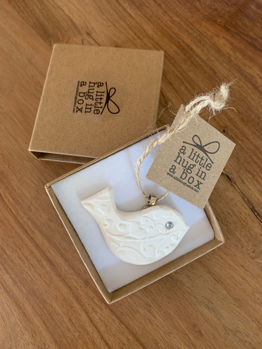  A Little Hug in a Box Hand Made  Porcelain Bird with Silver  eye 