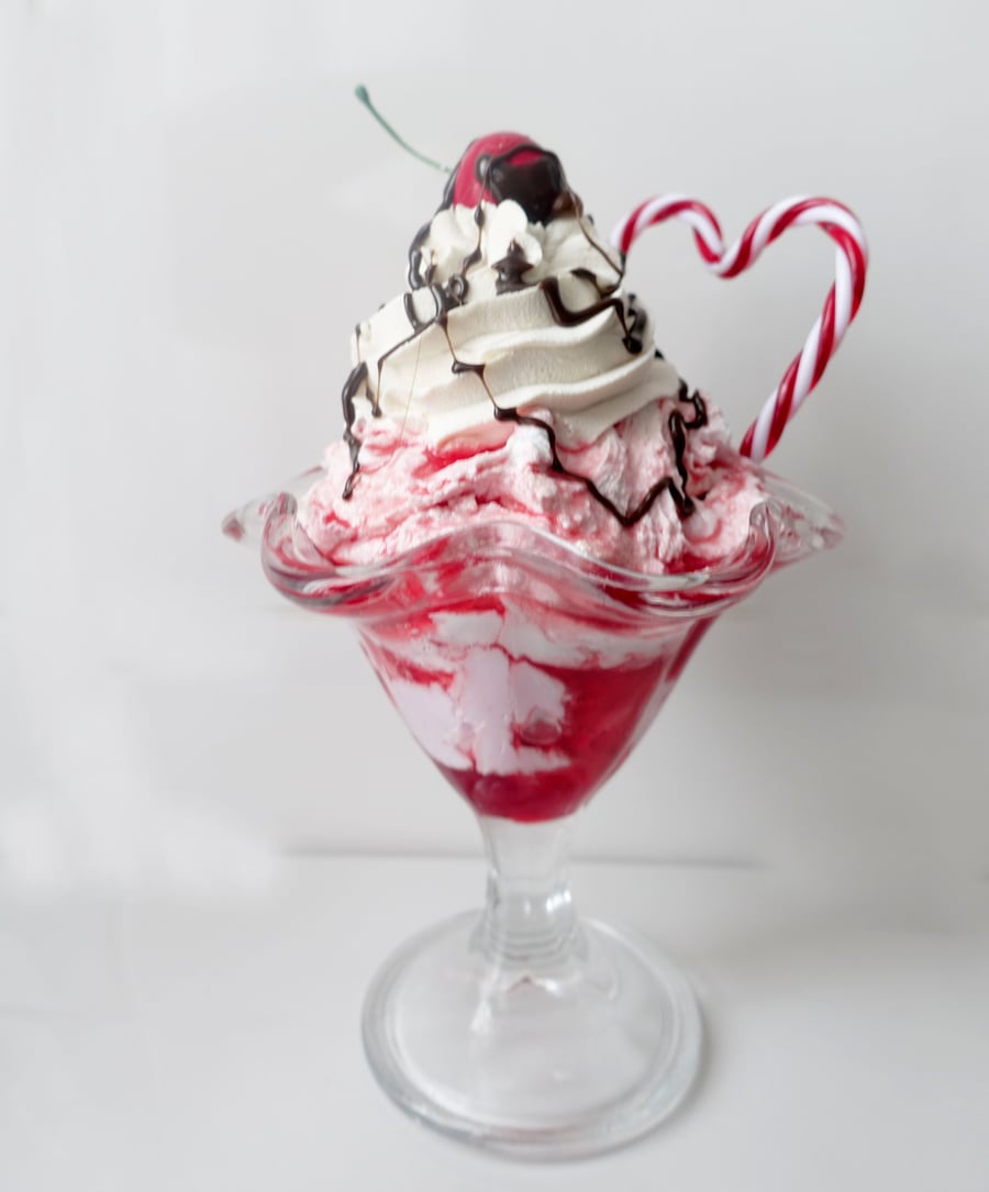 Pink themed fake food sundae with candy cane heart.  Prop food.  Kitchen Kitsch.
