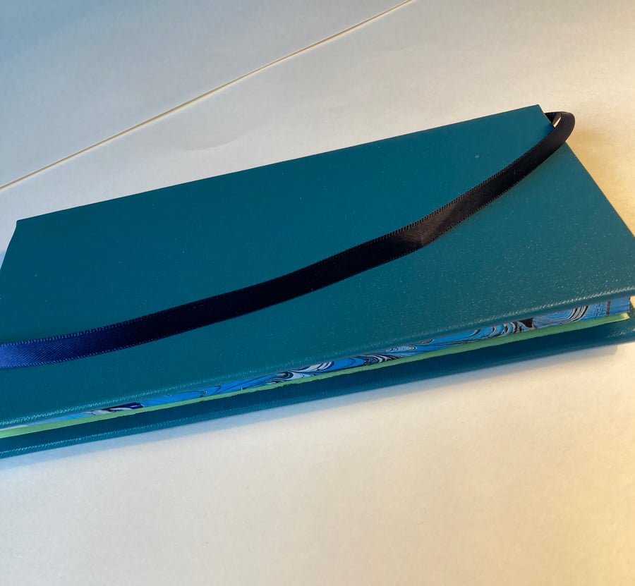 A writer's or an artist's book with marbled edges